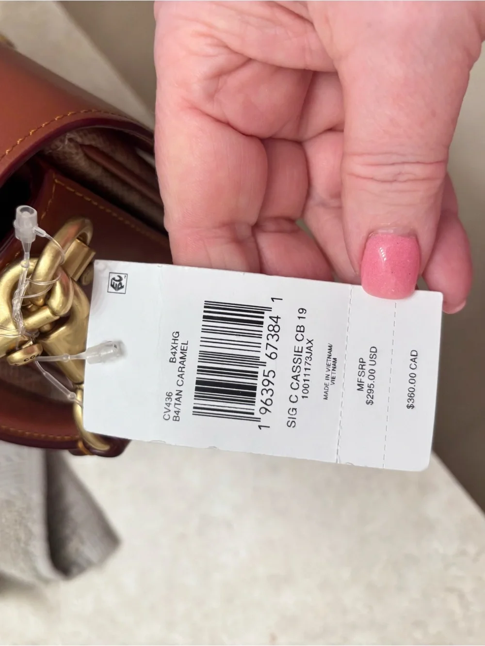 Coach Cassie Signature Canvas and Leather Saddle Bag in Brown